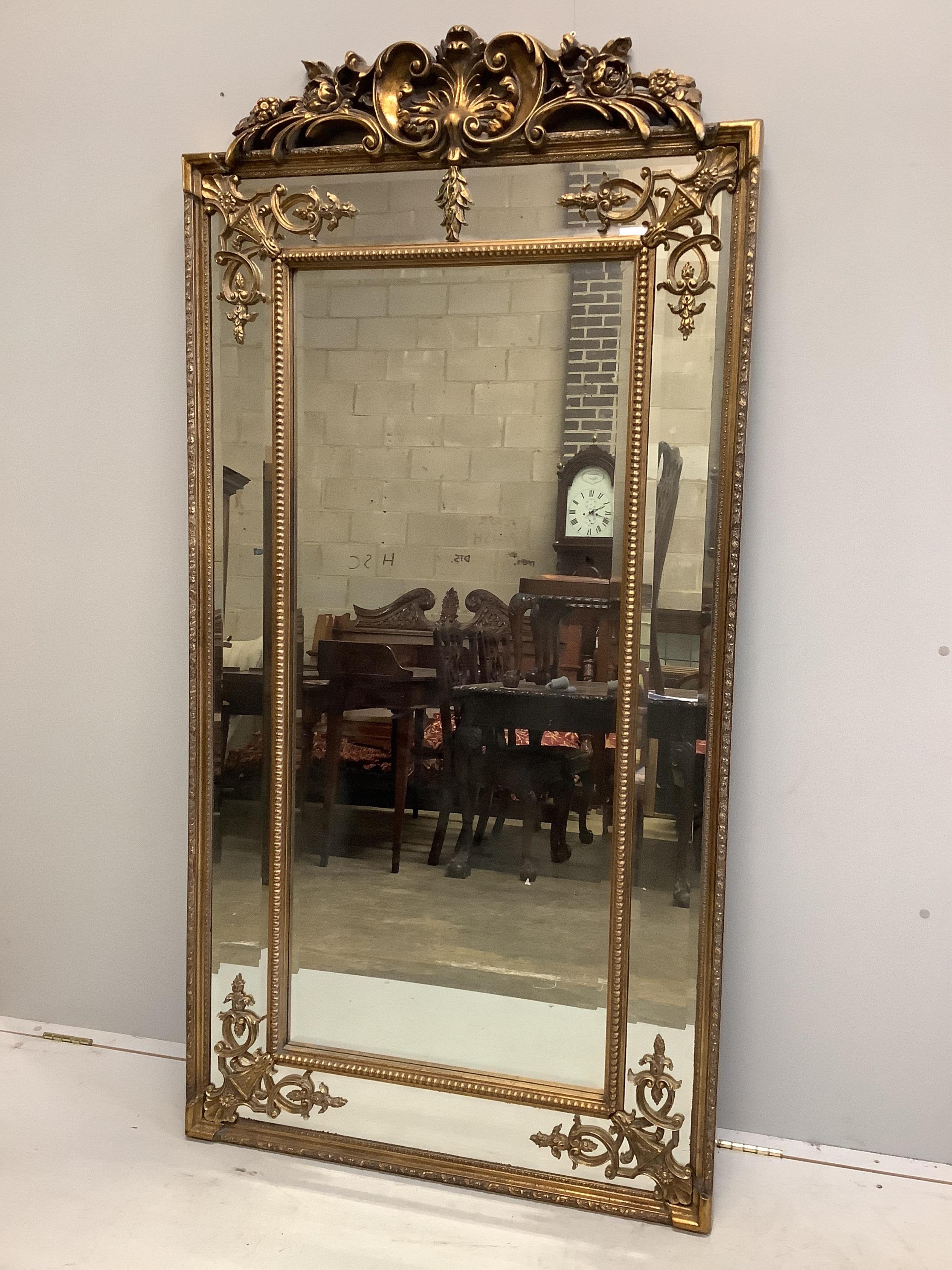A Victorian style rectangular gilt composition wall mirror, width 91cm, height 184cm. Condition - good